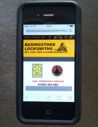 Mobile phone showing our mobile friendly web site on it